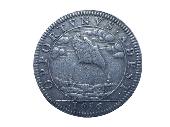 France, 1656. Silver ‘UFO’ Jeton depicting a shield in the sky. Tokens such as these have been interpreted by some as evidence of extra-terrestrials. Image: Author’s Collection.